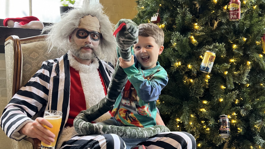 Holiday Photos with Beetlejuice Santa event photo