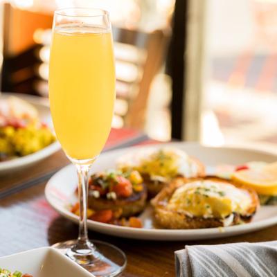 Eggs benedict and a drink.