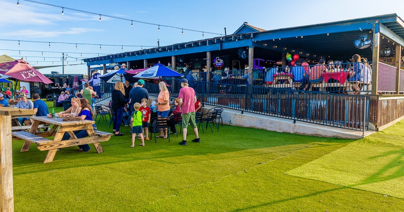 Outdoor seating area full of guests