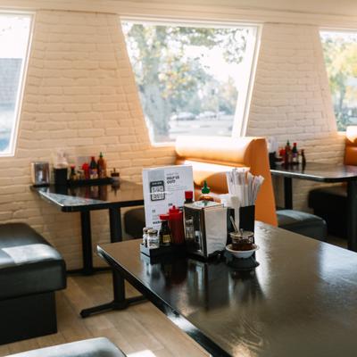 Diner area, tables, dnairs, booths.