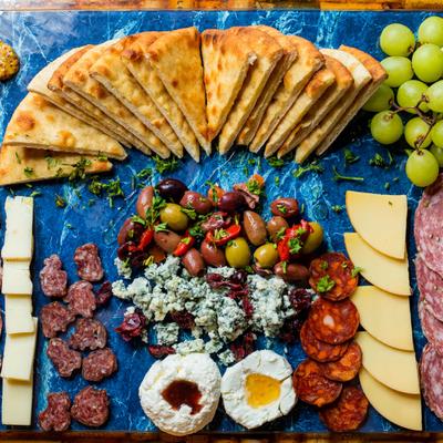 Various meats, cheese and crackers platter