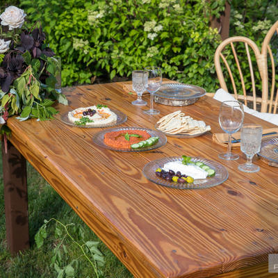 Groom and bride table with three dips and flat bread