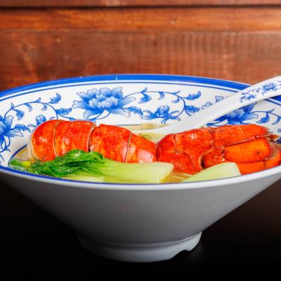 Noodle soup with lobster and bok choy.