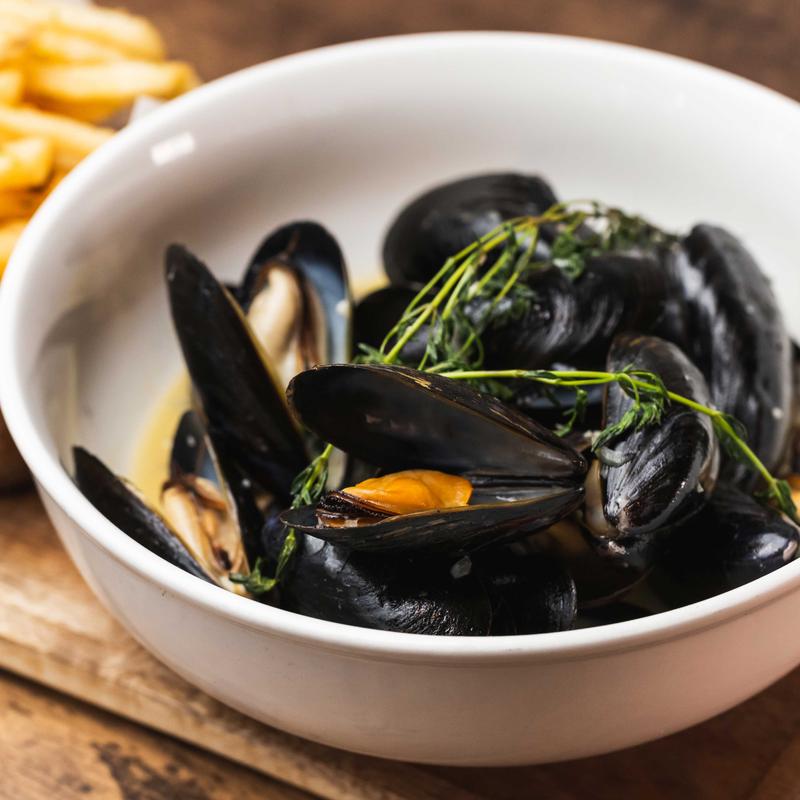 Steamed Mussels and French fies photo