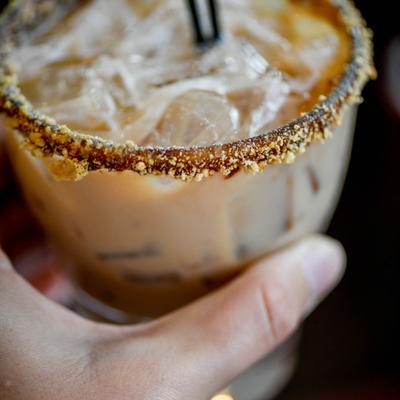 Bee Keeper cocktail with chocolate and Graham  cracker rim.