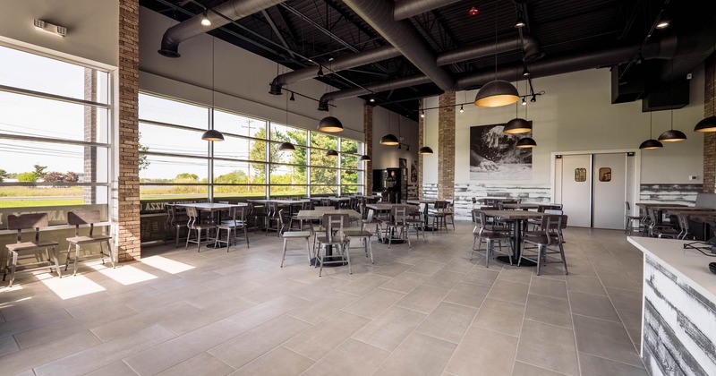 Interior, seating area with tables and chairs