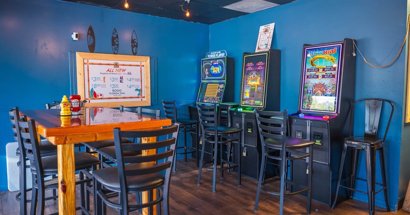 Interior, tables with stools ready for guests