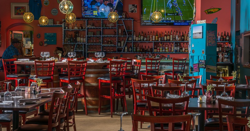 Diner tables and chairs, tv screens
