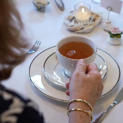 Customer having a cup of tea.
