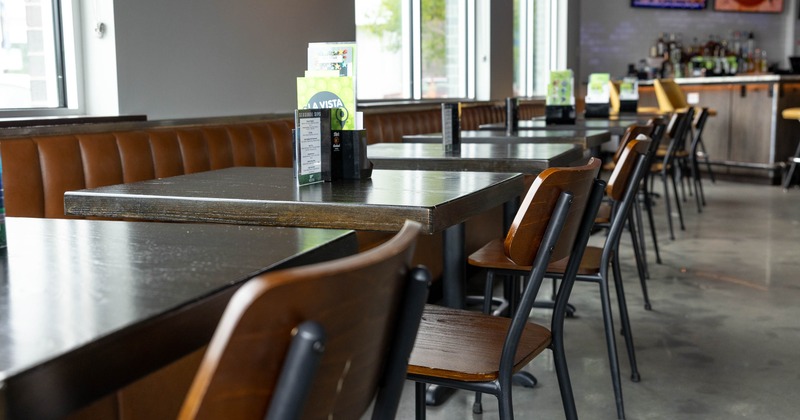 Interior, tables and chairs in dining area