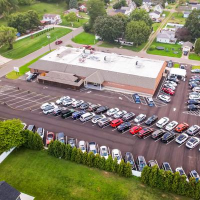Overhead view of building and parking lot.