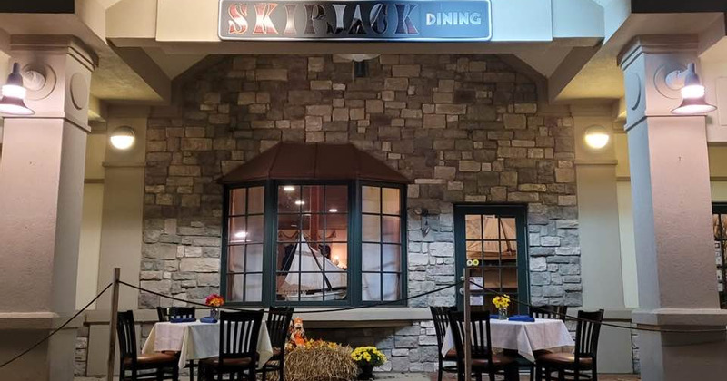 Interior, tables by the window and door