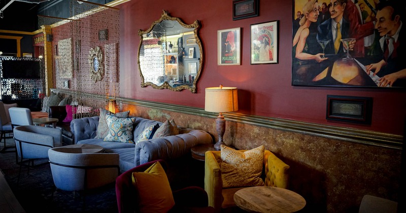 Sofas, tables and chairs, different decorations on the wall