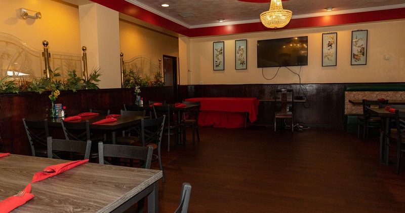 Interior, dining area, tables ready for guests