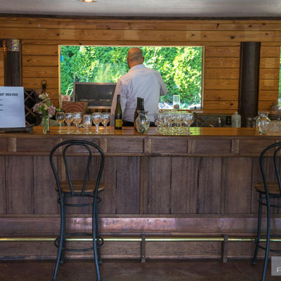 Bar area, barmen in the back