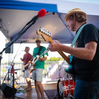 A band performing outside.