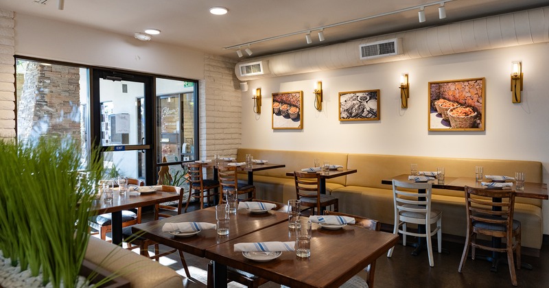 Restaurant interior, dining area with set tables