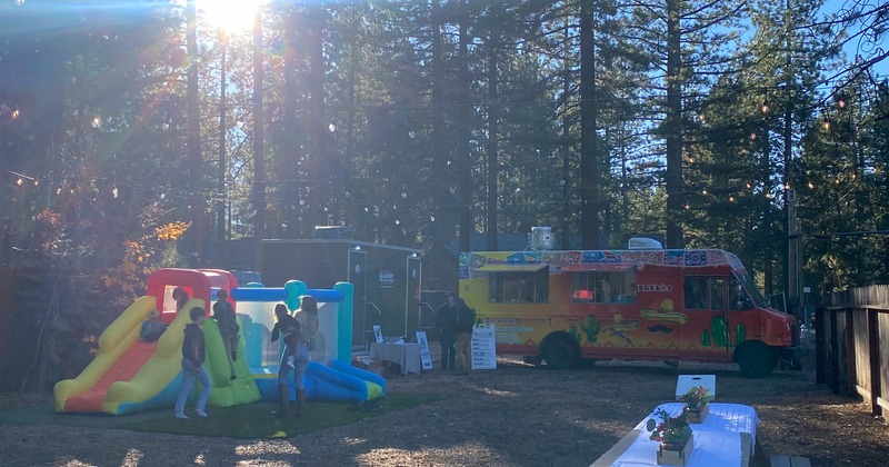 Inflatable children's play area and a food truck