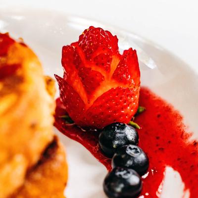 Stuffed French Toast, strawberries, and blueberries.
