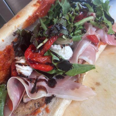 DELI boss on a wedge.