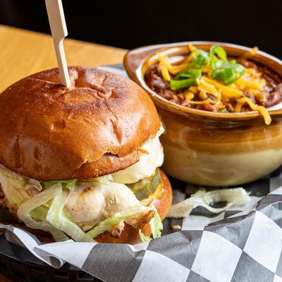Big Mac Burger served with pot chili.
