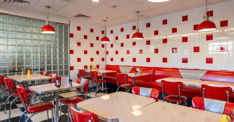Interior, red and white design, dining tables and seating