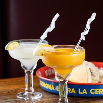 Frozen Mango drink on a table with Virgin Frozen Margarita.