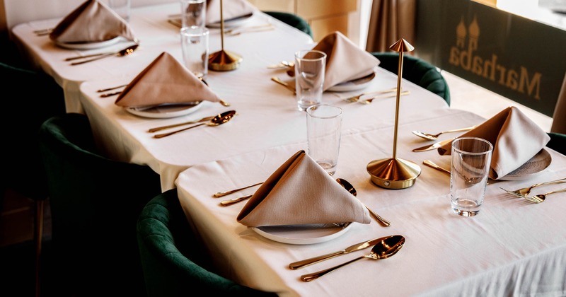 Interior, table set for guests