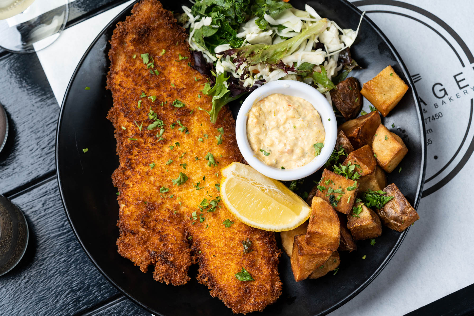 Danish fish filet  with Copenhagen potatoes, rye bread, and remoulade