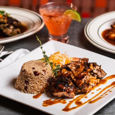 Jerk rubbed chicken, with rice.