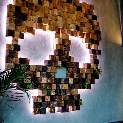 Skull shaped wall art made of wooden blocks.