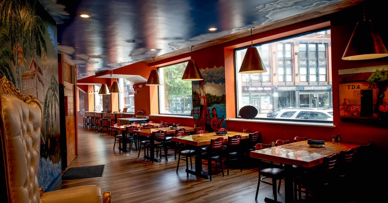 Interior, chair and table next to the big window