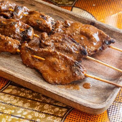 Beef suya, spiced beef skewers.