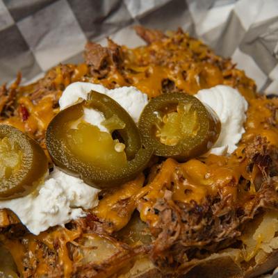 Loaded baked potato with jalapenos.