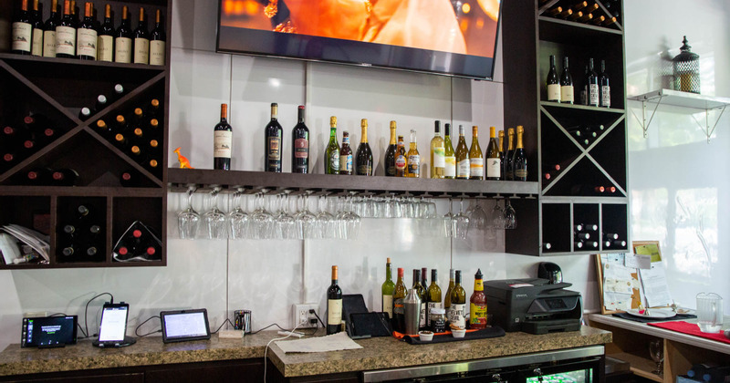 Interior, wine bottles behind the bar