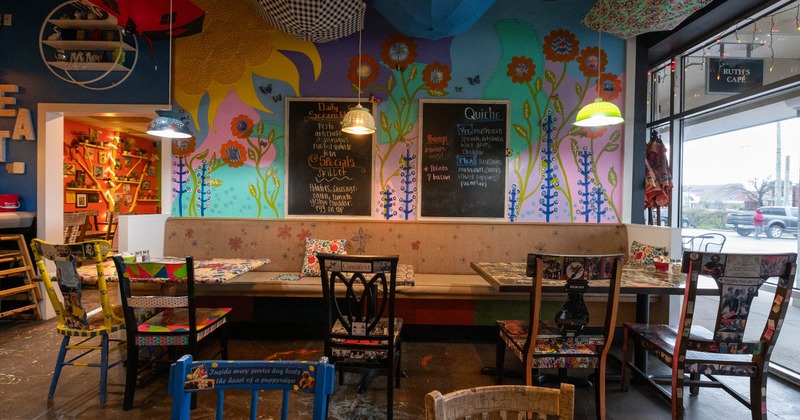 Interior, dining area with booths, tables and chairs