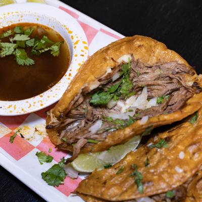 Beef birria tacos, with birria broth.