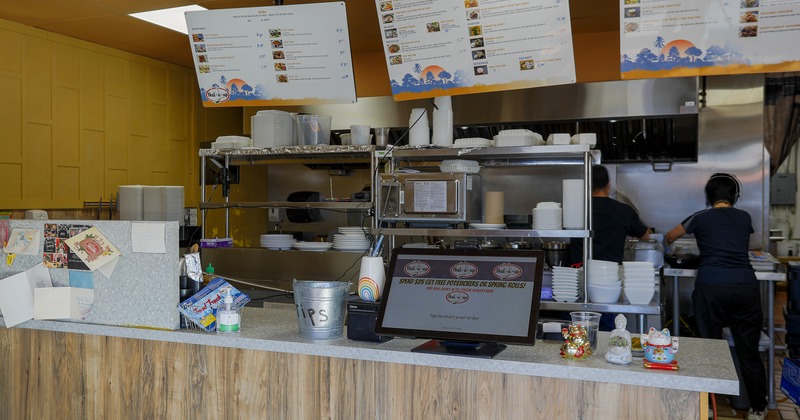 Food counter, tv screen above