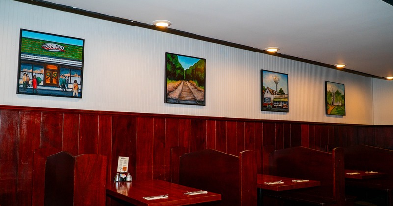 Interior, dining area with pictures on the wall