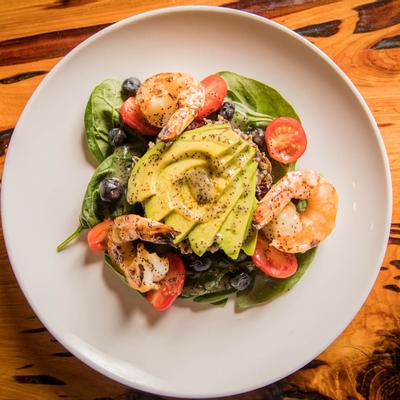 Avocado, wild rice and shrimp salad, top view