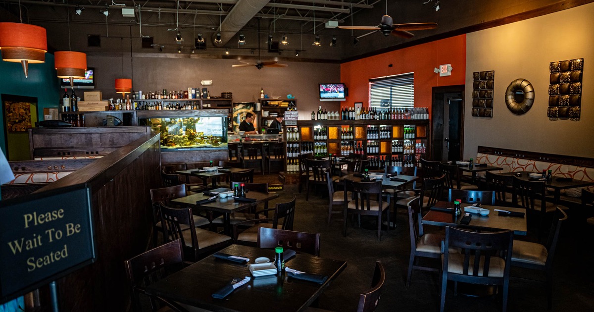 Interior, wide view of dining area, tables and chairs