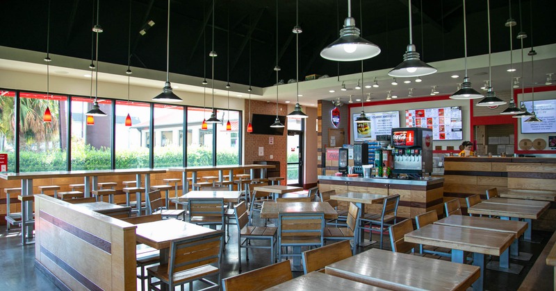 Interior, seating area with tables and chairs
