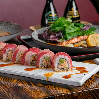 Snow crab, avocado, tuna, and yellowtail sushi rolls.
