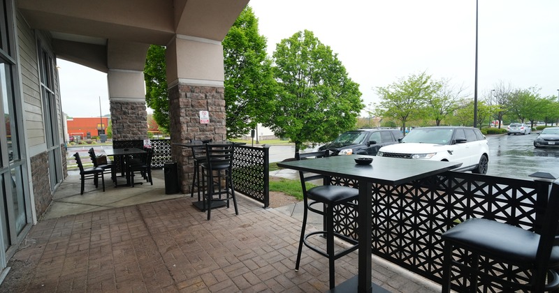 Exterior., terrace, tables, chairs