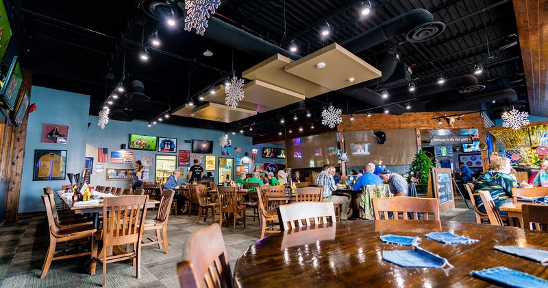 Interior, seating area, guests sitting at tables