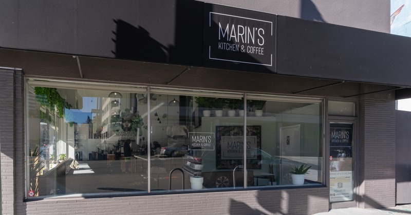 Exterior, front  view to restaurant, entrabnce, sign