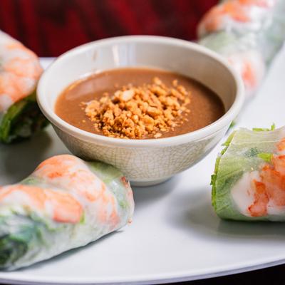 Shrimp summer rolls served with peanut sauce.