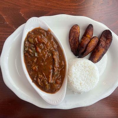 Pulled pork stew, with rice, and fried plantains.