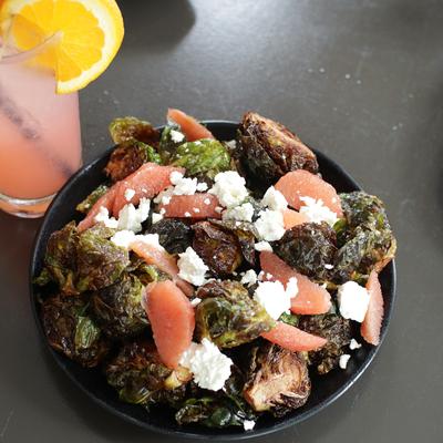 Crispy brussels sprouts, with grapefruit and cheese.