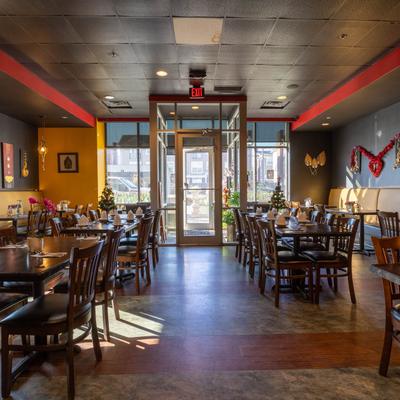 Interior, entrance door of restaurant and seating area